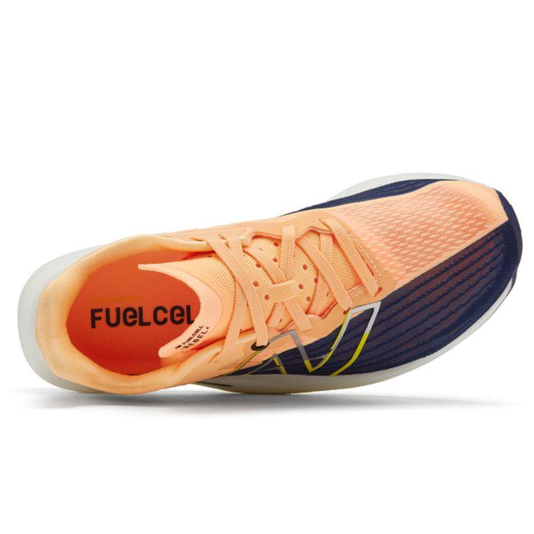 New Balance Женские кроссовки FuelCell Rebel v2 Night Tide Light Mango оранжевые WFCXCM2