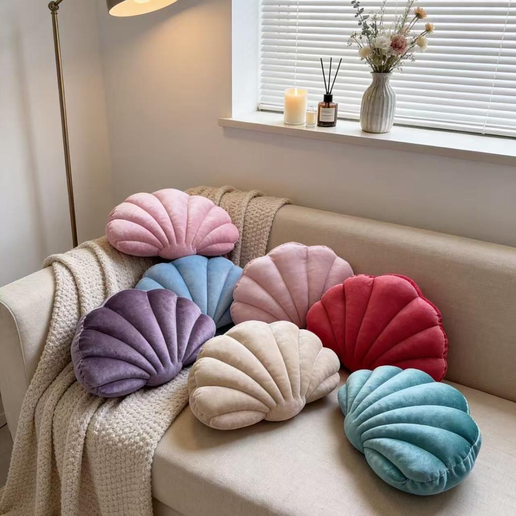 A seashell-shaped pillow, suitable for living room sofas, bedrooms, offices, and home decor.