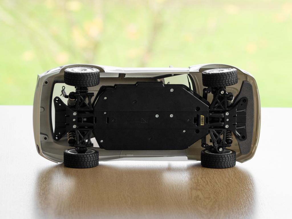 Tamiya Серия электрических радиоуправляемых машин 1998 Ford Escort Custom 58691 1/10 №691 (Шасси ТТ-02)