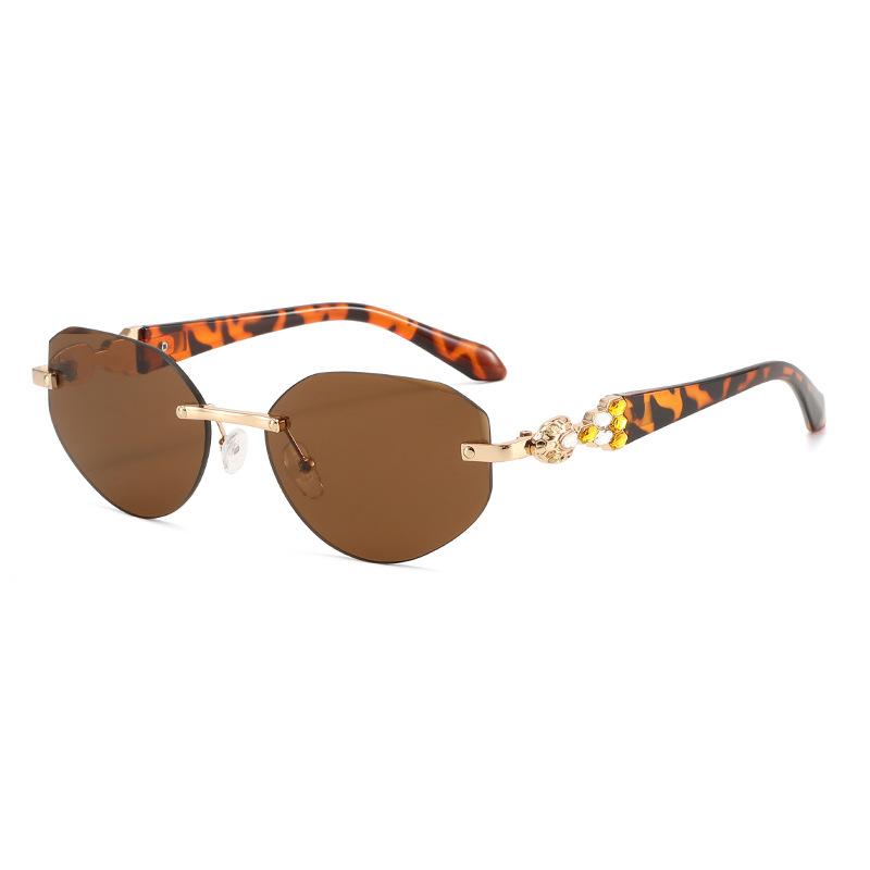 European and American frameless oval cat eye sunglasses women's square and round face thin fashion glasses gem-set diamond light luxury sunglasses