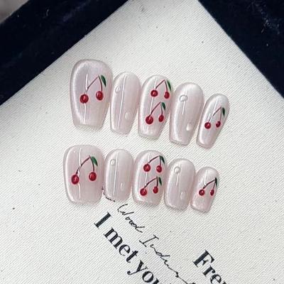 Чисто ручная работа Фототерапия Носимые накладные ногти Медовый сок Вишня Носимые накладные ногти Готовый продукт Многоразовые наклейки для ногтей