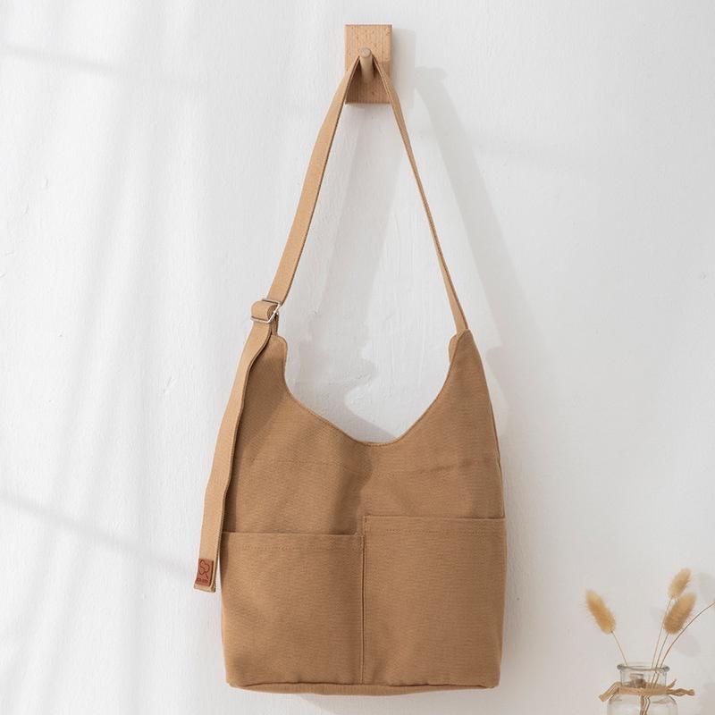 IELGY Large-capacity multi-pocket Japanese style simple messenger canvas bag women