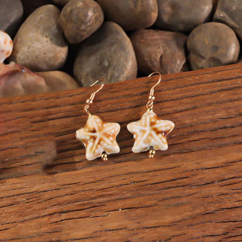 Bohemian vacation style egg flower necklace earrings set ins niche flower soft pottery color collarbone chain tide