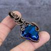 Натуральный драгоценный камень голубой топаз, кулон ручной работы с оплеткой из медной проволоки, 2,40" Y5Q69