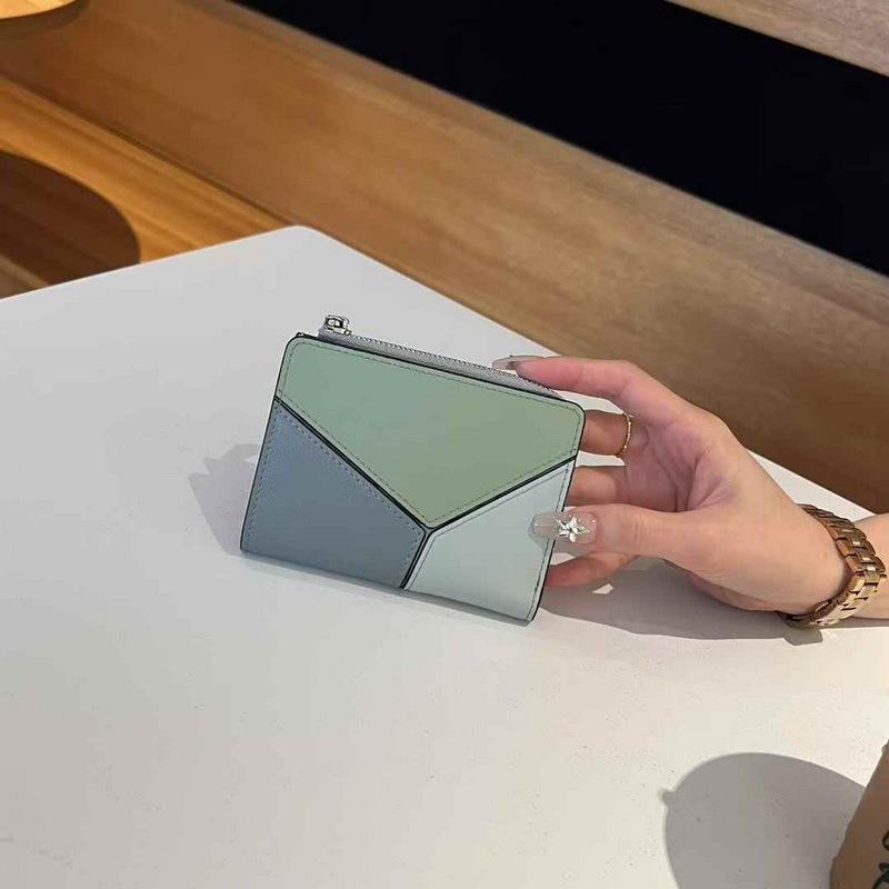 2025 New Genuine Leather Wallet Head Layer Leather Women's Handbag Short Style Simple Color Contrasting Geometric Splicing Women's Wallet