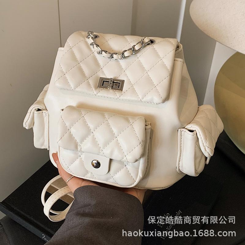 Женский рюкзак с ромбовидной вышивкой, нишевый дизайн, 2025 новый популярный универсальный маленький рюкзак-ведро на цепочке, маленькая школьная сумка