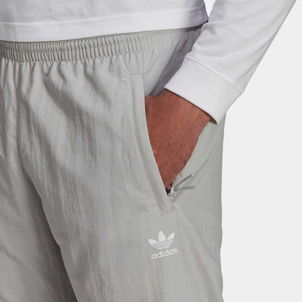 adidas Мужские вязаные спортивные штаны светло-серые с умеренной манжетой HC7113
