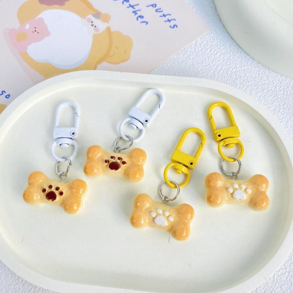Sweet Puppy Paw Bone Keychain - Cute and Stylish Backpack Accessory for Couples and Students