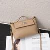 All-matching Retro Design Top-layer Cowhide 2026 Lock-up Fashionable Casual Commuting Portable One-shoulder Cross-body Bag