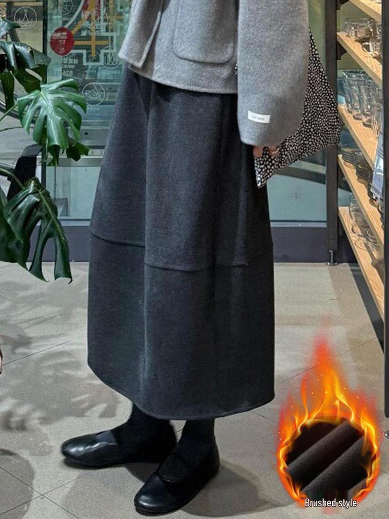 Женская серая шерстяная юбка-полусолнце А-силуэта с бархатной подкладкой на осень/зиму 2025 - Высокая талия, средняя длина, стройнящий дизайн.