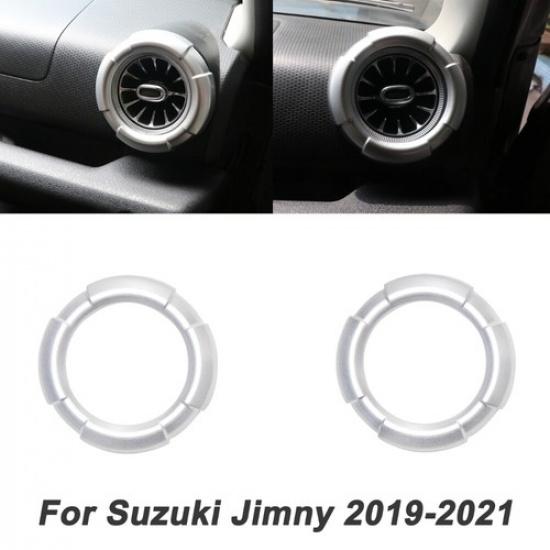 Пара серебристых накладок на центральный дефлектор кондиционера для Suzuki Jimny -
