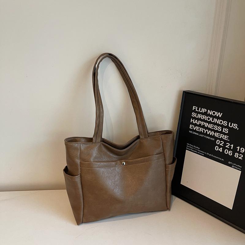 2025 лето новая зарубежная темпераментная простая сумка-тоут большой вместимости модный тренд женская повседневная сумка через плечо