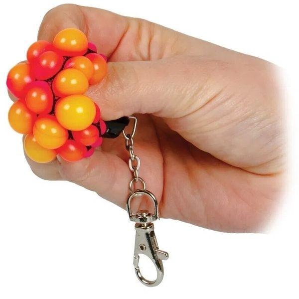 Брелок антистресс с релаксационным гнойничковым шариком