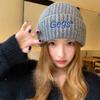 Outdoor casual ear protection hat 2026 autumn and winter new embroidered knitted hat fashionable big head circumference showing face small wool hat