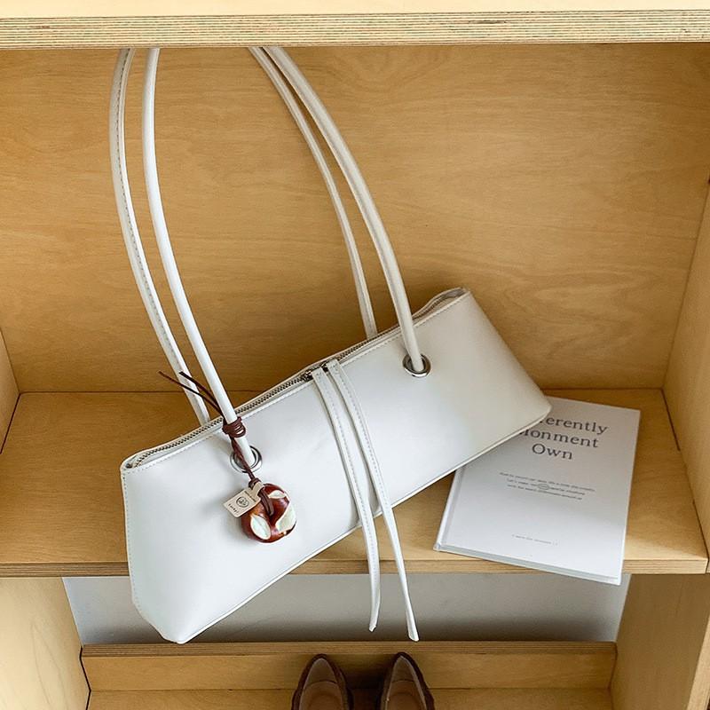 2025 Cross-border New French Pure Color Fashionable One-shoulder Bag Women's Niche Design High-end Armpit Stick