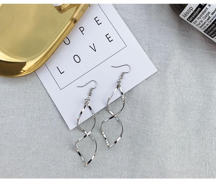 Современные геометрические серьги-капли в виде спиральной волны - Модные металлические украшения для женщин