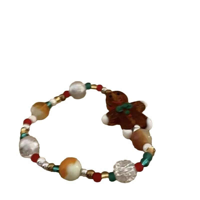 Рождественский бисерный браслет «Пряничный человечек» - Праздничный дизайн, ручное украшение