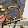 Роскошная вышитая шелком сумочка, ретро-сумка-ракушка с бамбуковой ручкой в дворцовом стиле, женский высококлассный китайский литературный вечерний клатч