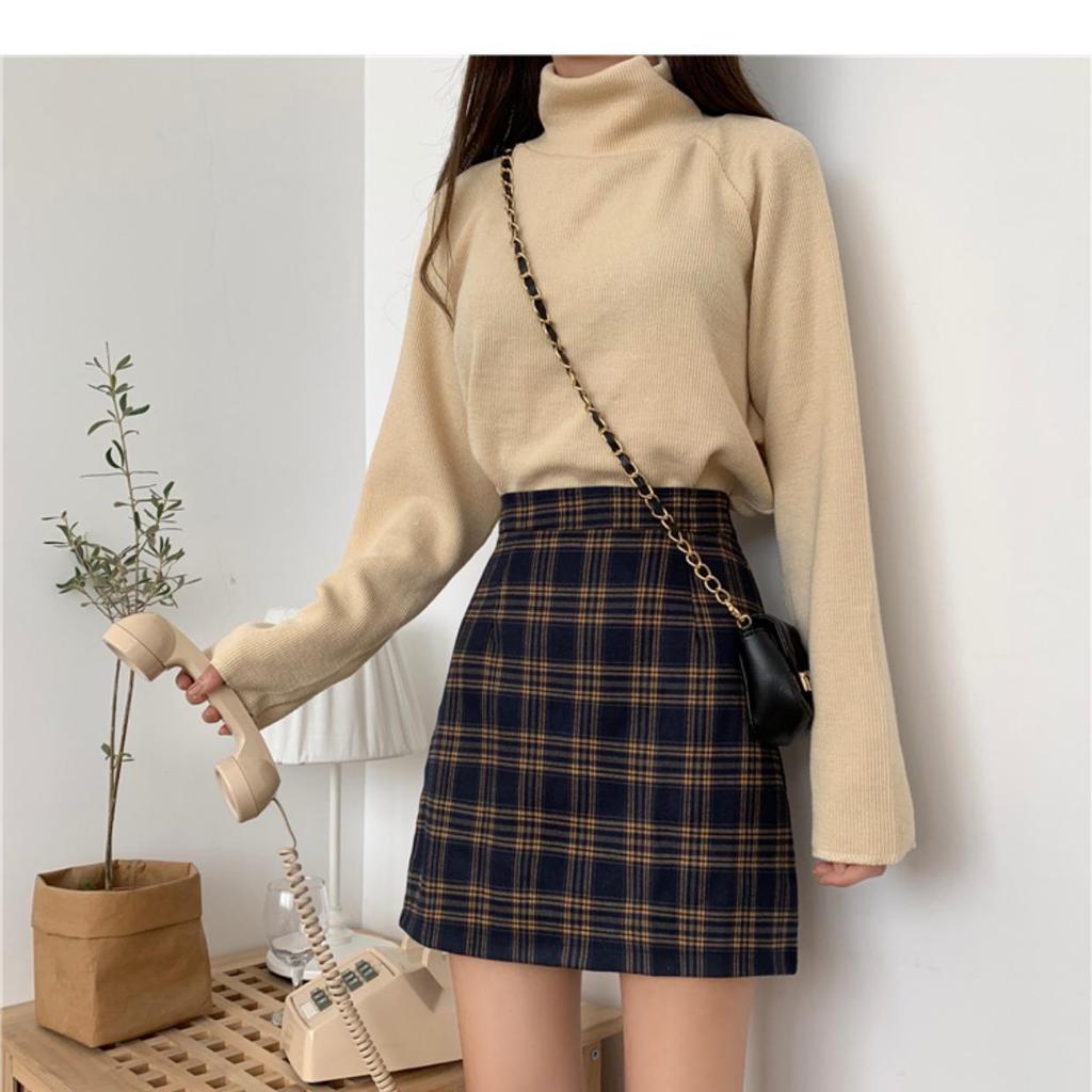Юбка А-силуэта с высокой талией в клетку для женщин — тренд осени/зимы 2023 года