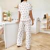 Spring and Autumn Women's Wide-Leg Print Pajama Set: Comfortable Short Sleeve Top and Long Pants for Indoor/Outdoor Wear.