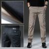 Весенние повседневные мужские брюки. Тонкие прямые эластичные универсальные брюки в корейском стиле цвета хаки.