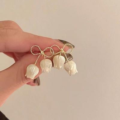 Серьги в форме буквы L, Элегантные серьги, Серьги в форме банта. Уникальный дизайн, универсальные и стильные серьги.