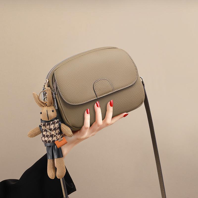 Новая женская сумка из натуральной кожи, сумка через плечо, маленькая круглая сумка, легкая, роскошная, нишевая, высококачественная сумка через плечо