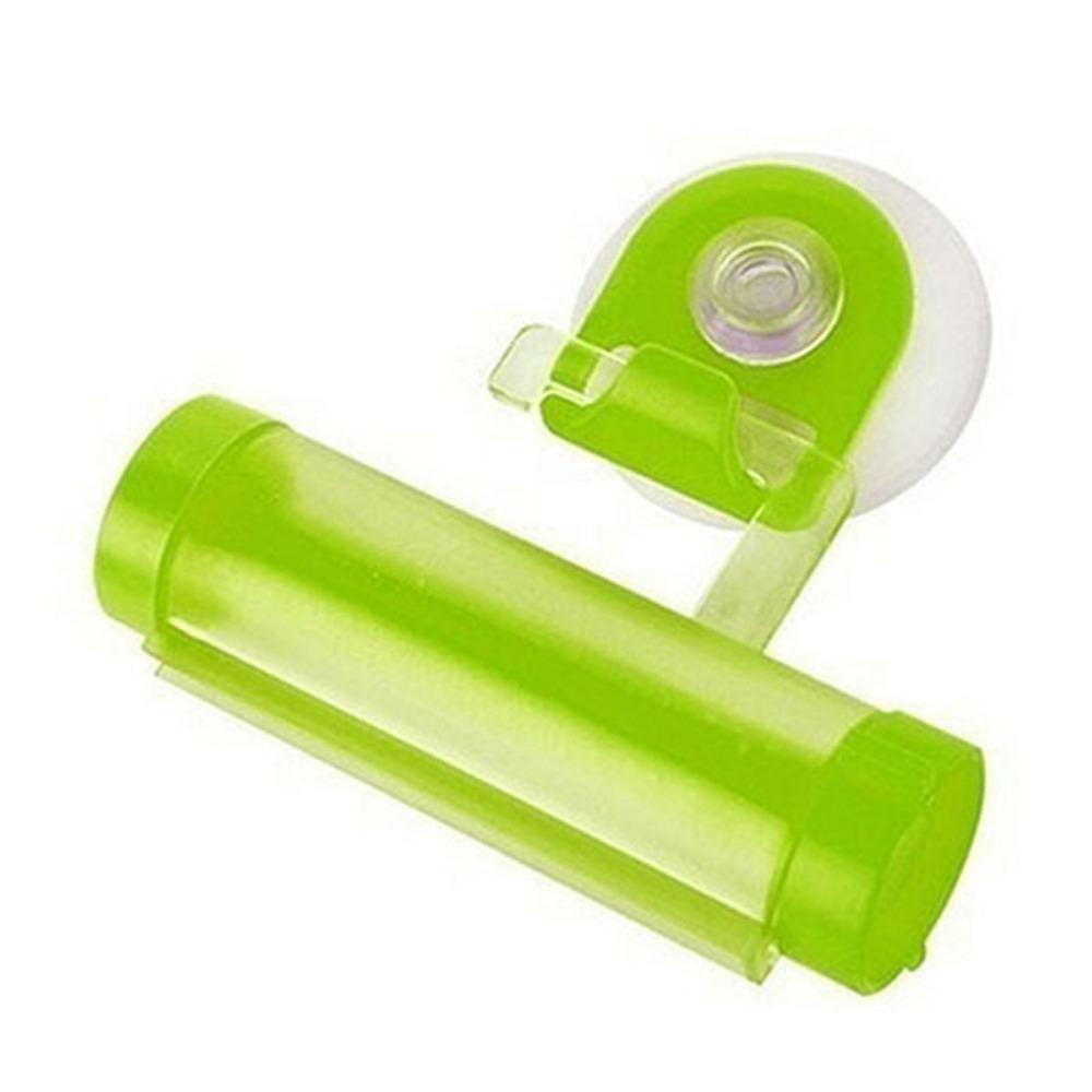 Plastic Device - A Suction Cup Press for Convenient Storage and Uniform Squeezing of Toothpaste Tubes
