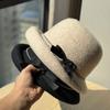 Новая шляпа-рыбачка из серой шерсти с бантом в стиле Цяньцзинь для женщин на осень и зиму, маленькая шляпка-цилиндр, подчеркивающая темперамент, шляпа-ведро