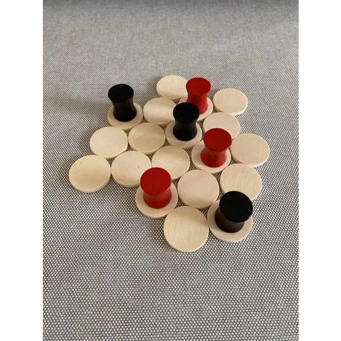 NONAGA Jeu de société Six jetons sont déplacés sur le petit terrain de jeu.