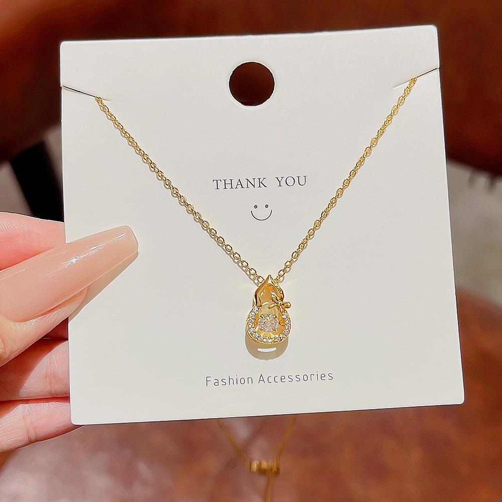 Ожерелье из титановой стали, женская счастливая тыква, ключичная цепочка, бьющееся сердце, простые и холодные разговоры о ветре, умный кулон, прилив