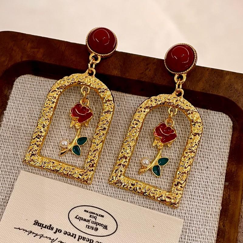 Модные серьги-подвески для женщин