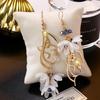 Трансграничная продажа Креативные серьги для девочки-цветочницы Асимметричные хрустальные длинные серьги-кисточки на крючках Женские модные аксессуары