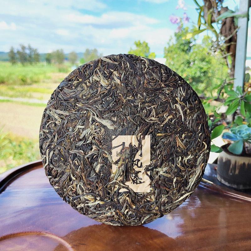 Соскабливающий чайный пирог Пуэр со стенами Иу Древнее дерево Сырой чай Первая весна Юньнаньский чай
