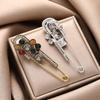 Retro Light Luxury Safety Pin Denim Skirt Pants: Creative Design Brooch for Waist Tightening