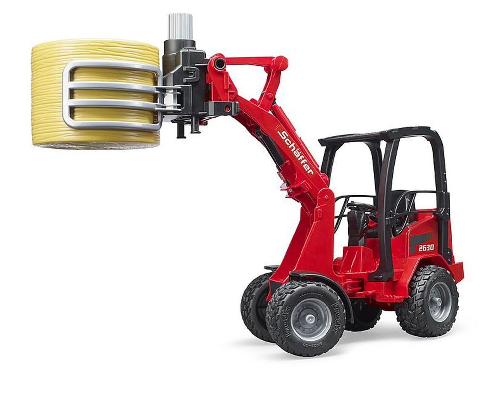 BRUDER Компактный погрузчик Schaffer и захват для тюков с соломой