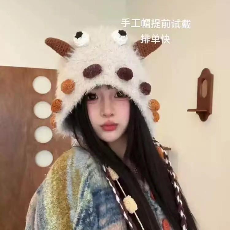 Cute little monster plush hat women's autumn and winter outdoor thermal pullover hat, ear protector, small handmade headgear