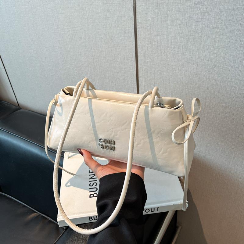 Премиальная сумка женская новая модная универсальная на плечо подмышку сумка-багет для通勤