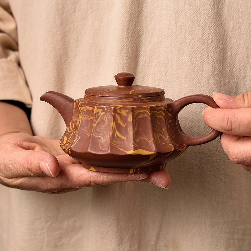 Retro all-handmade hand-pulled Zhu mud teapot Zisha pot Zhang's tea brewer household size twisted mud pot