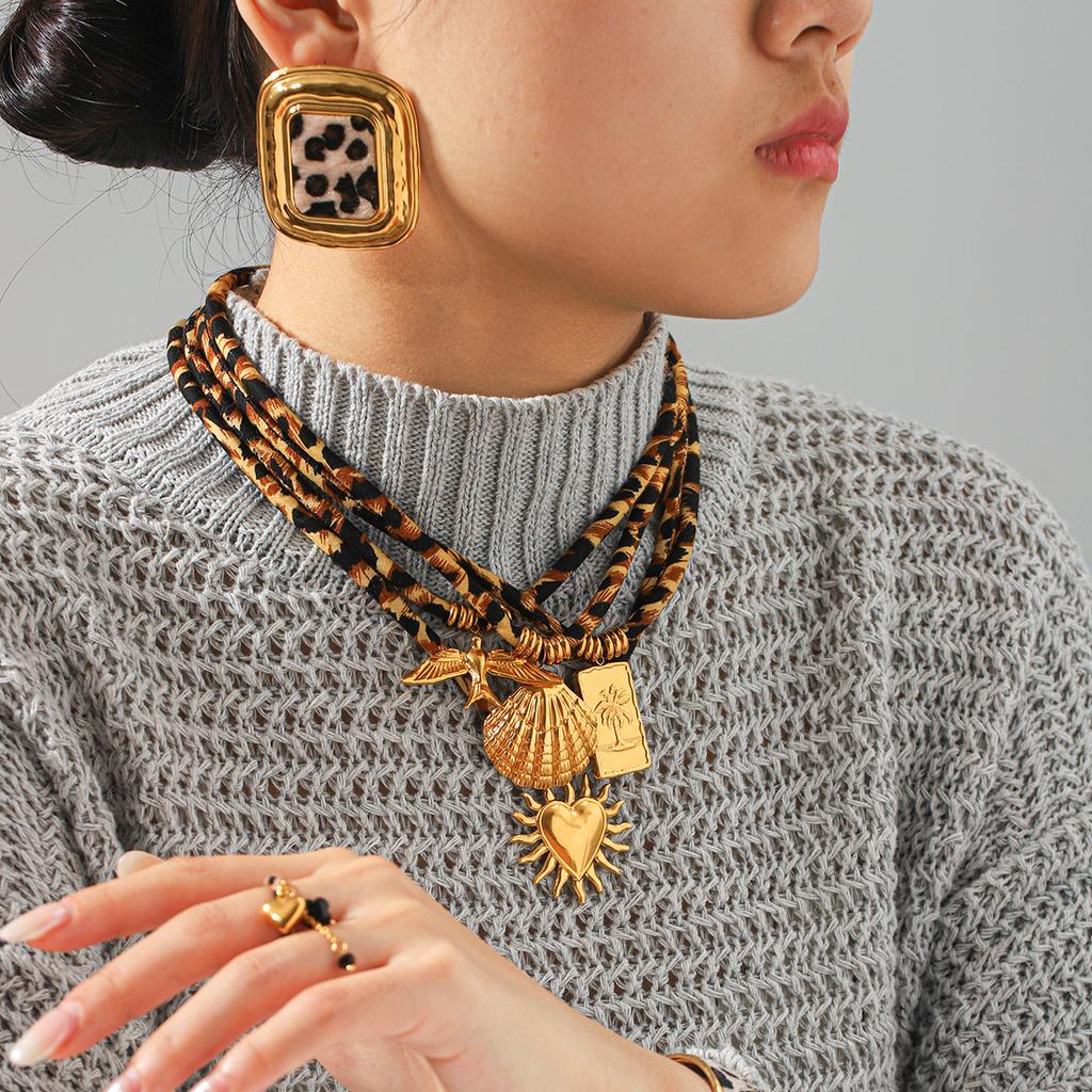 Retro leopard print woven rope necklace, niche high-end bracelet, fashionable versatile titanium steel earrings