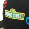 New Era 59FIFTY Sesame Street Collaboration 7 5950 SESAME ALLOVER BLK Cap, Black, 1/2 Inch,