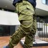 2024 Весенняя мужская мода High Street Брюки-карго Мужской тренд Светоотражающие спортивные брюки с несколькими карманами Мужские повседневные свободные комбинезоны большого размера
