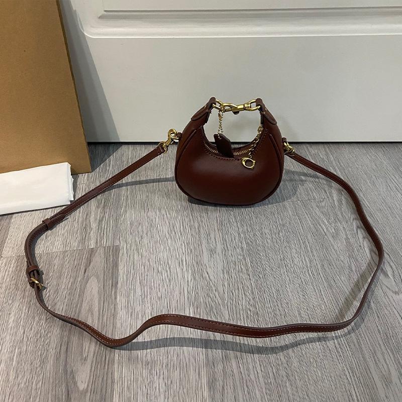 "2024 Women's Jonie Mini Retro Half-Moon Underarm Crossbody Bag"