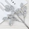 Hot-selling Christmas decoration gold powder simulation leaves, festival holly leaves, shooting props