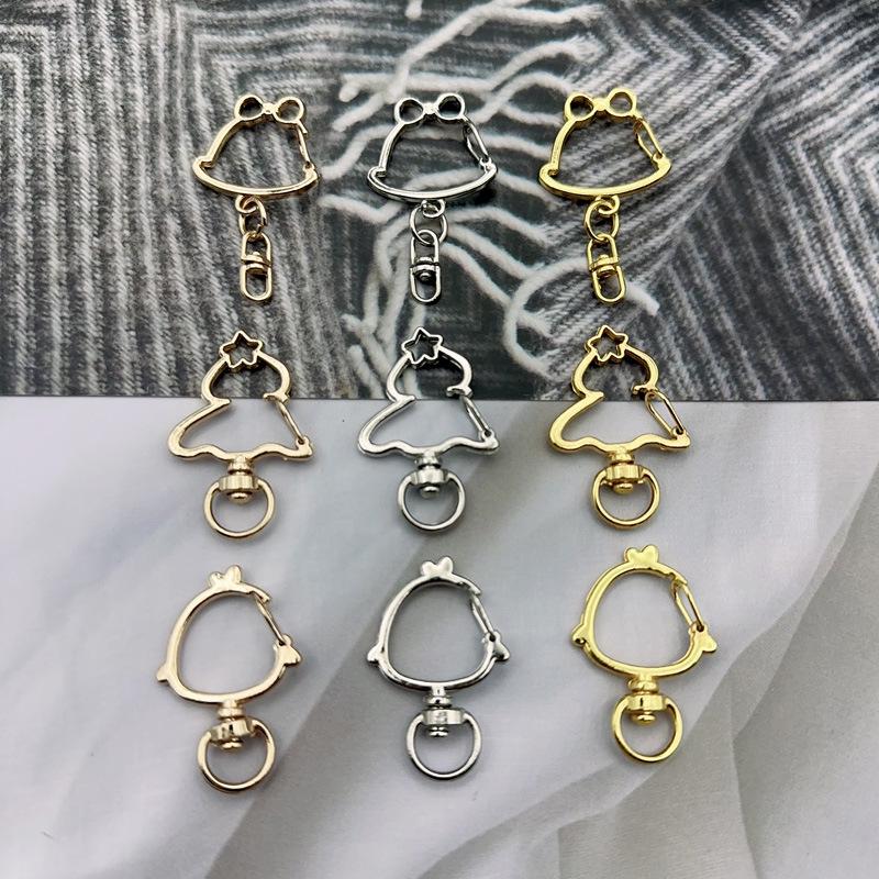 Handmade Metal Rotating Chick Keychain with Christmas Bell and Color Retention.