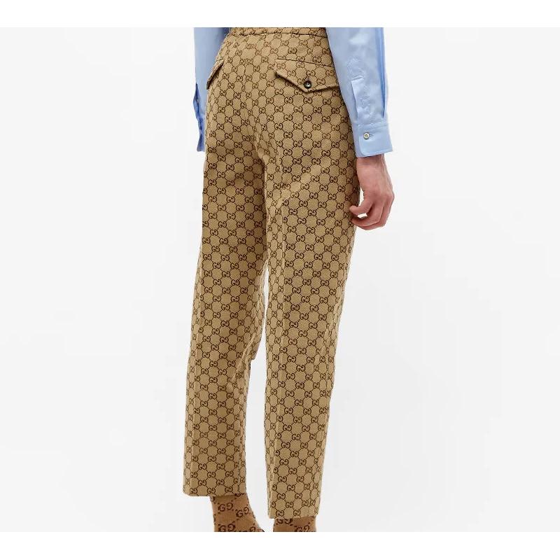 Gucci Спортивные брюки с принтом GG 569769-ZKU09-2580