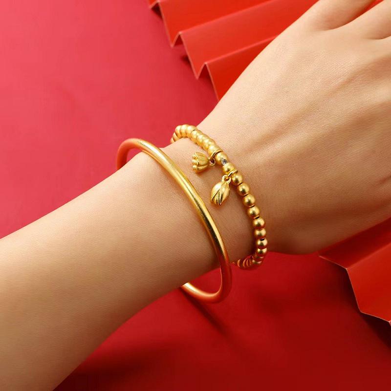 Браслет-лотос вьетнамского происхождения из песочного золота с имитацией простого золотого кольца