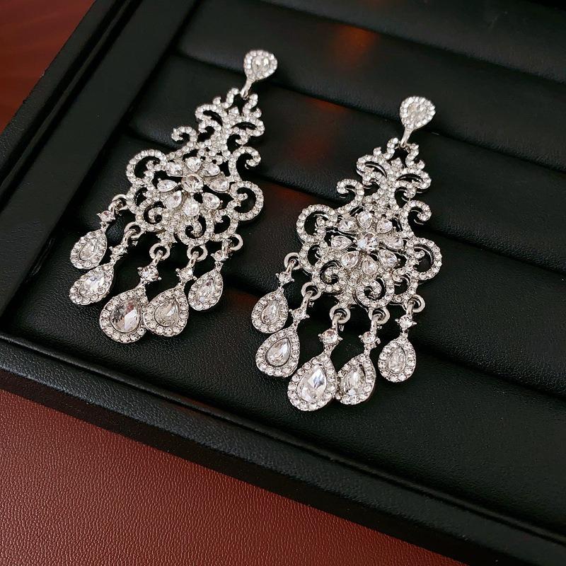 Серьги-подвески с серебряной иглой, бриллиантовым цветком, каплей воды и кисточкой, преувеличенные серьги, легкая роскошь, премиальные серьги для женщин