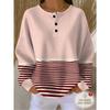 Women's Three-Button Henley Collar Waffle Long-Sleeve Top, Featuring a Contrasting Stripe Patchwork Design.