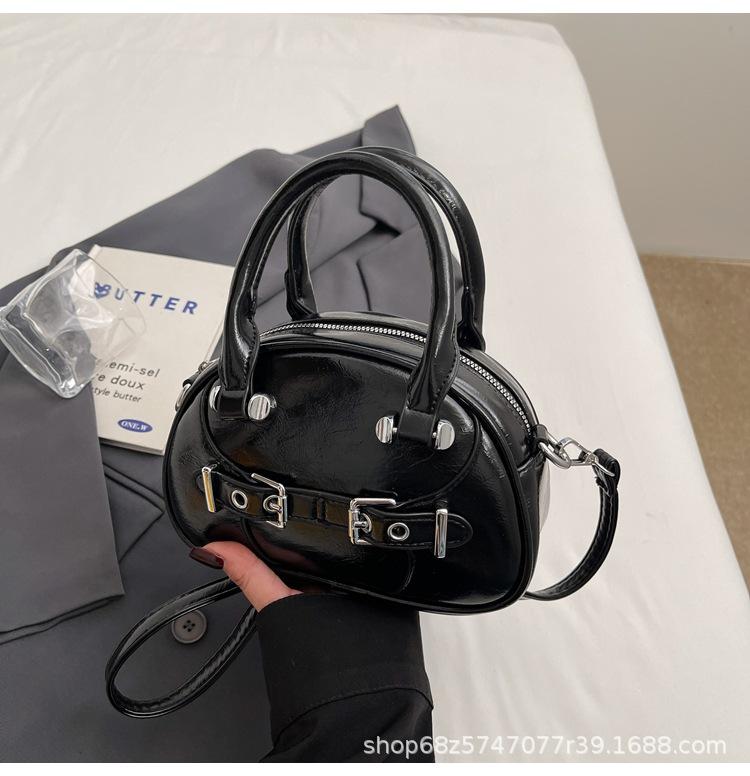 2025 spring new simple hand-held fashionable shell bag women's shoulder bag Korean version of underarm bag casual women's bag